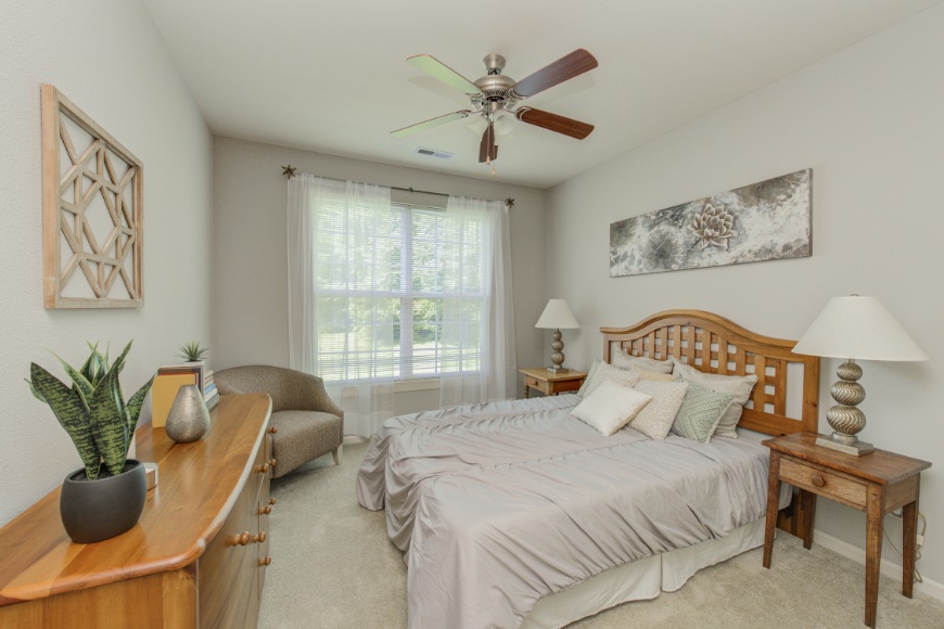 Model bedroom in a Greenwood apartment.