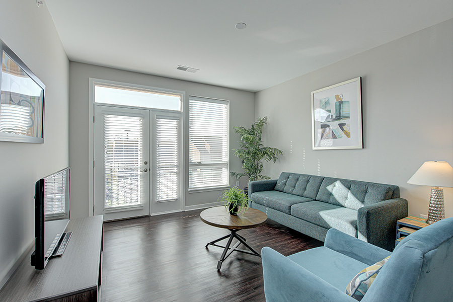 A studio apartment living room at Riverview Apartments.